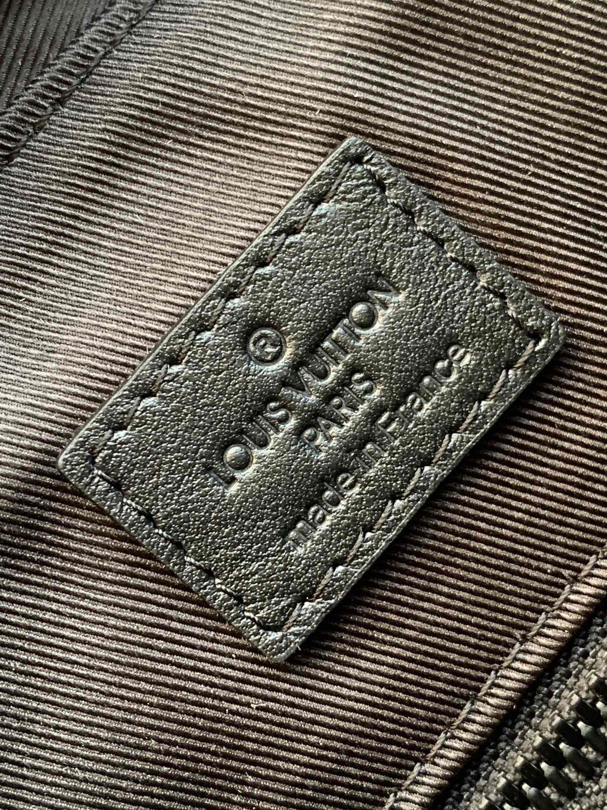 Louis Vuitton Discovery Backpack 54 in Black Embossed Monogram Calfskin