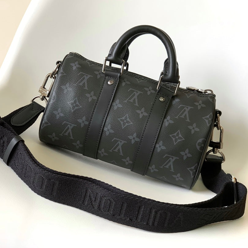 Louis Vuitton Keepall Bandoulière 25 in Black Monogram Heritage Canvas Bag