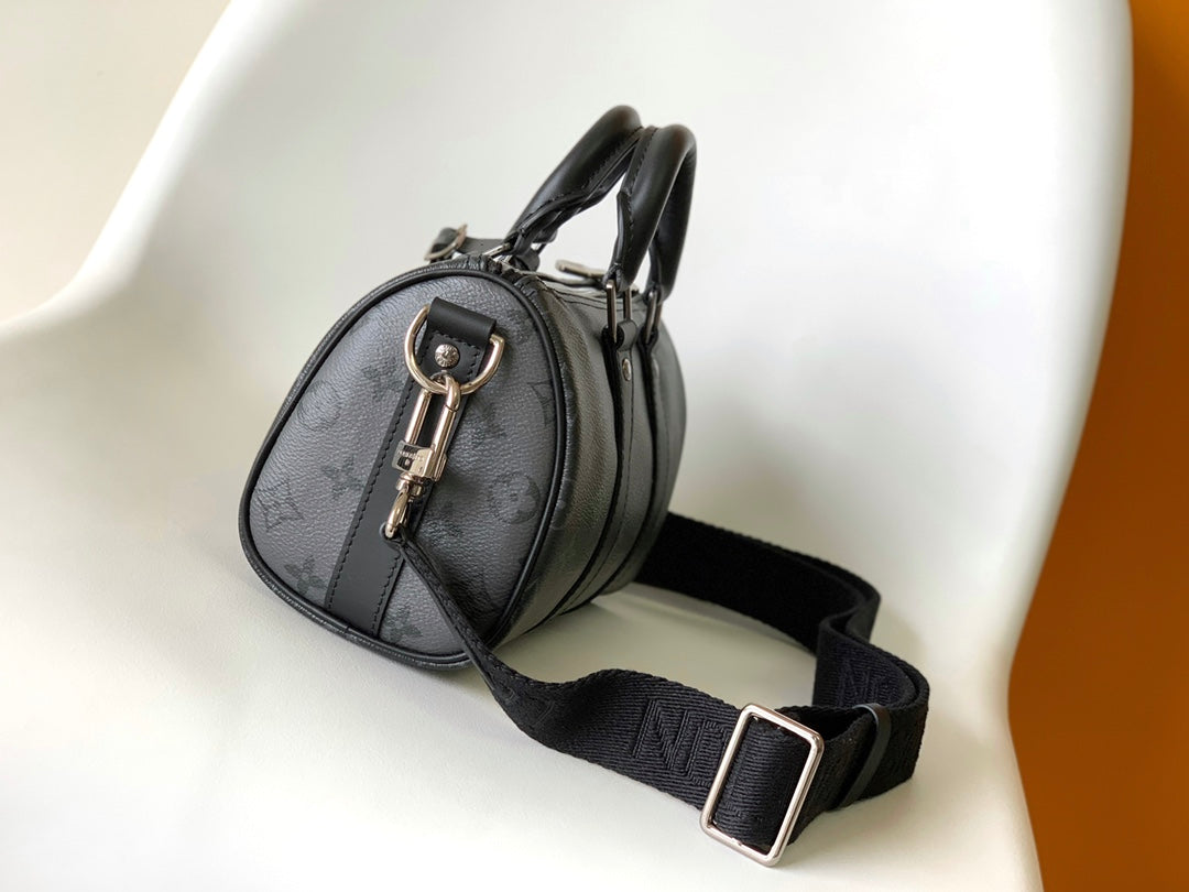 Louis Vuitton Keepall Bandoulière 25 in Black Monogram Heritage Canvas Bag