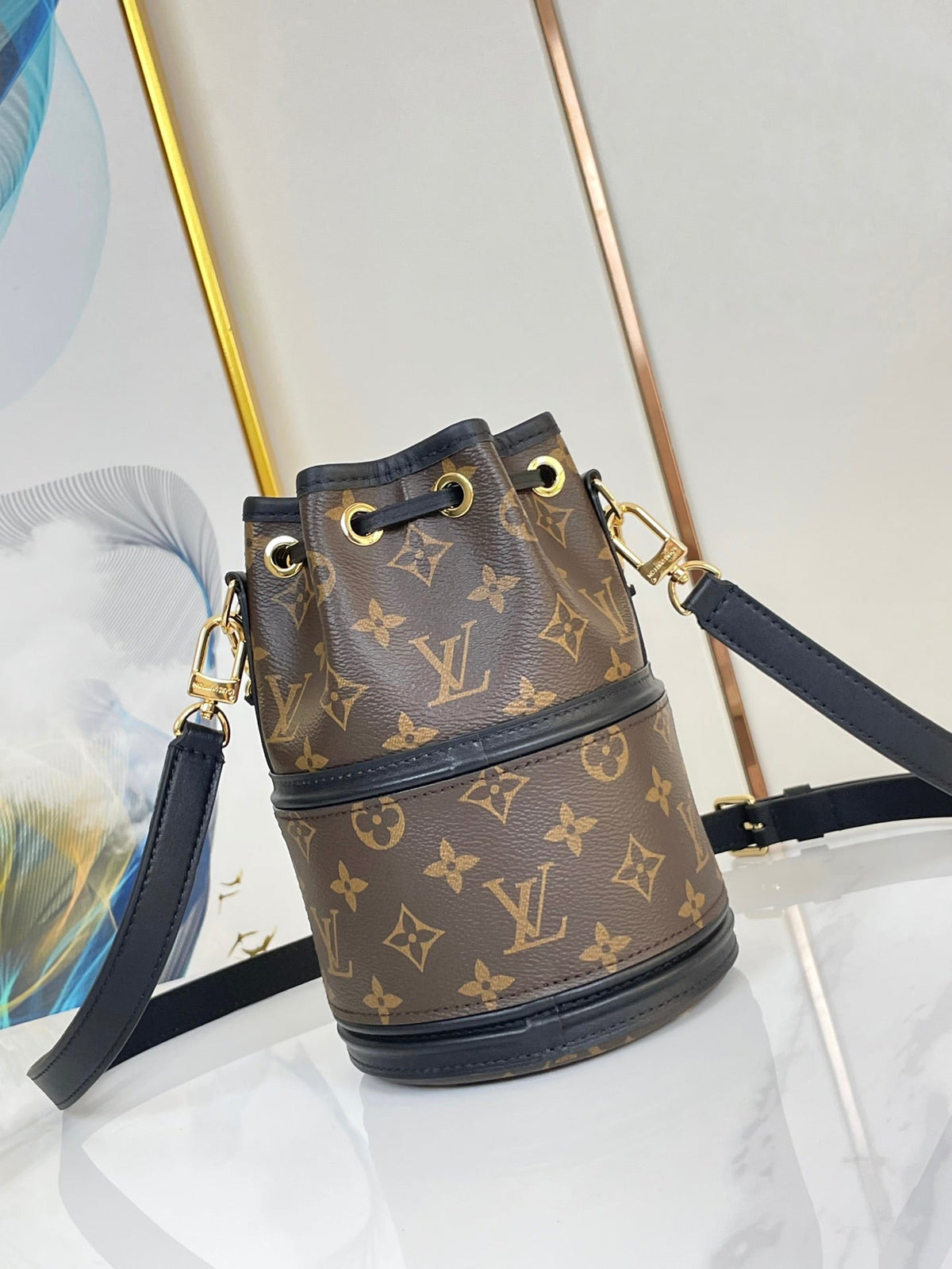 Louis Vuitton Canoé 20 in Brown Monogram Canvas Gold Hardware Bag