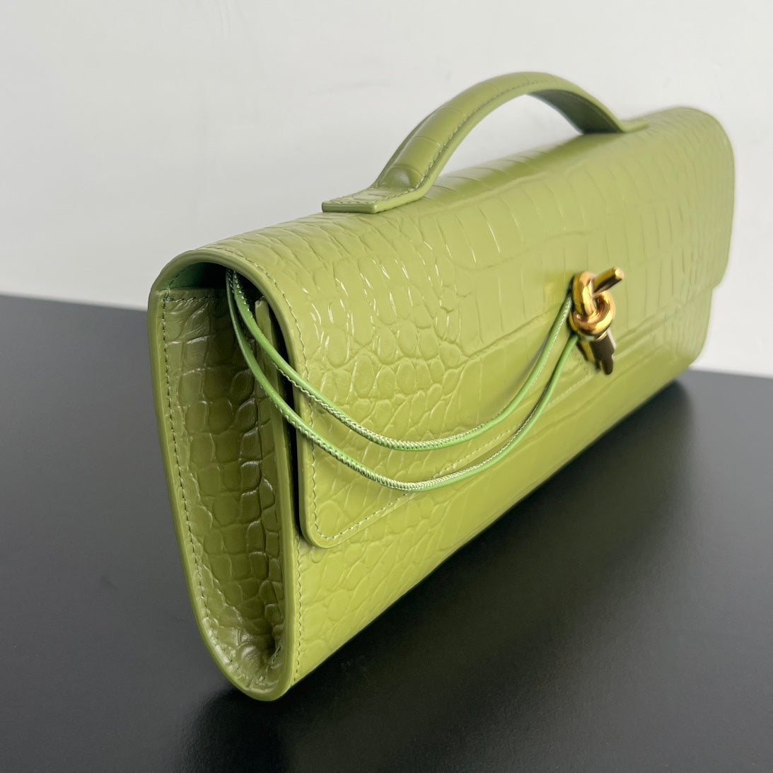Bottega Veneta Andiamo Clutch 31 in Barley Corn Crocodile Pattern Calfskin