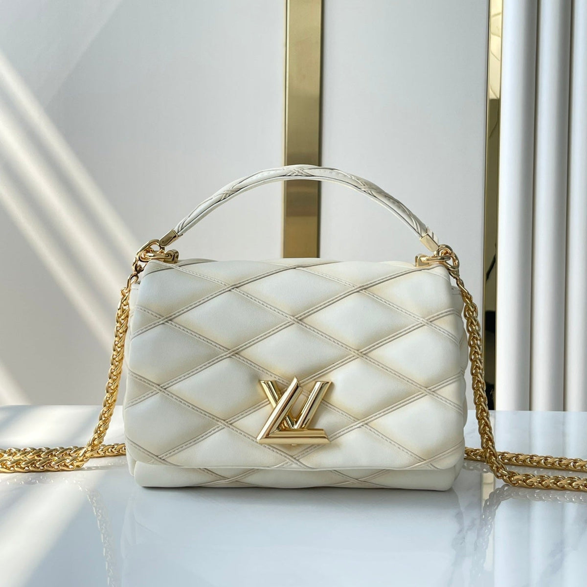 Louis Vuitton GO-14 PM 20 in Cream Quilted Lambskin Gold Hardware Bag