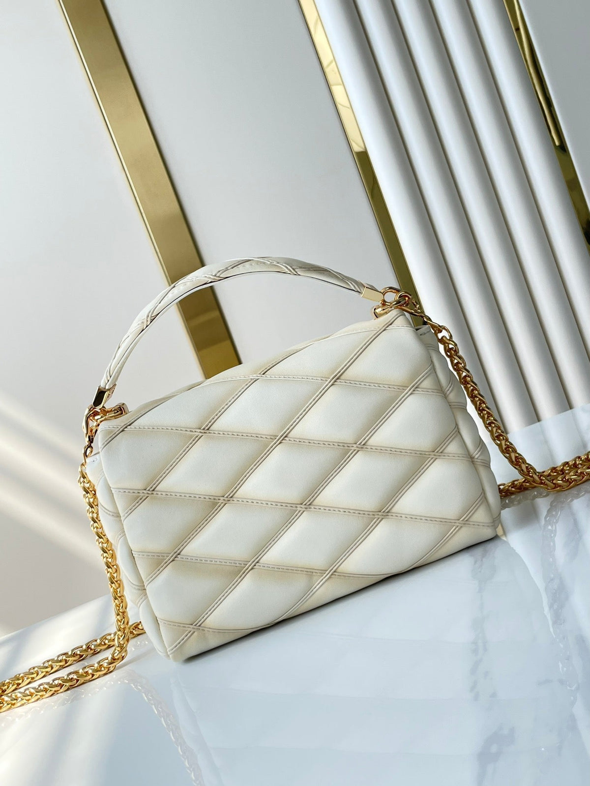 Louis Vuitton GO-14 PM 20 in Cream Quilted Lambskin Gold Hardware Bag