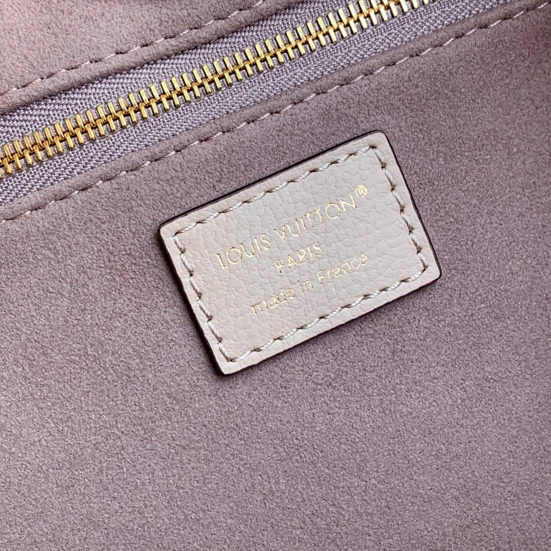 Louis Vuitton Anytime PM 34 in Nude Pink Monogram Empreinte Calfskin Bag