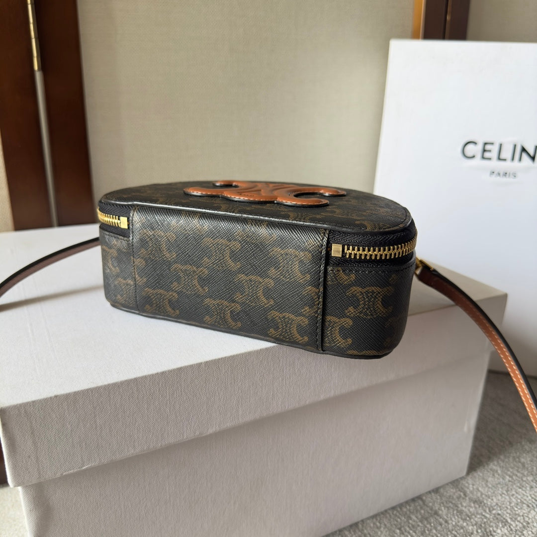 Celine Half Moon Case 18 in Black Triomphe Canvas and Bronze Brown Calfskin
