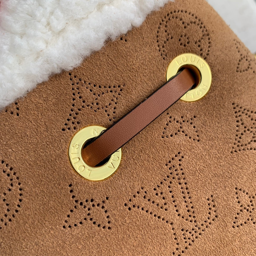 Louis Vuitton Bella 22 in Cinnamon Brown Monogram Perforated Suede and White Shearling Trim Bag