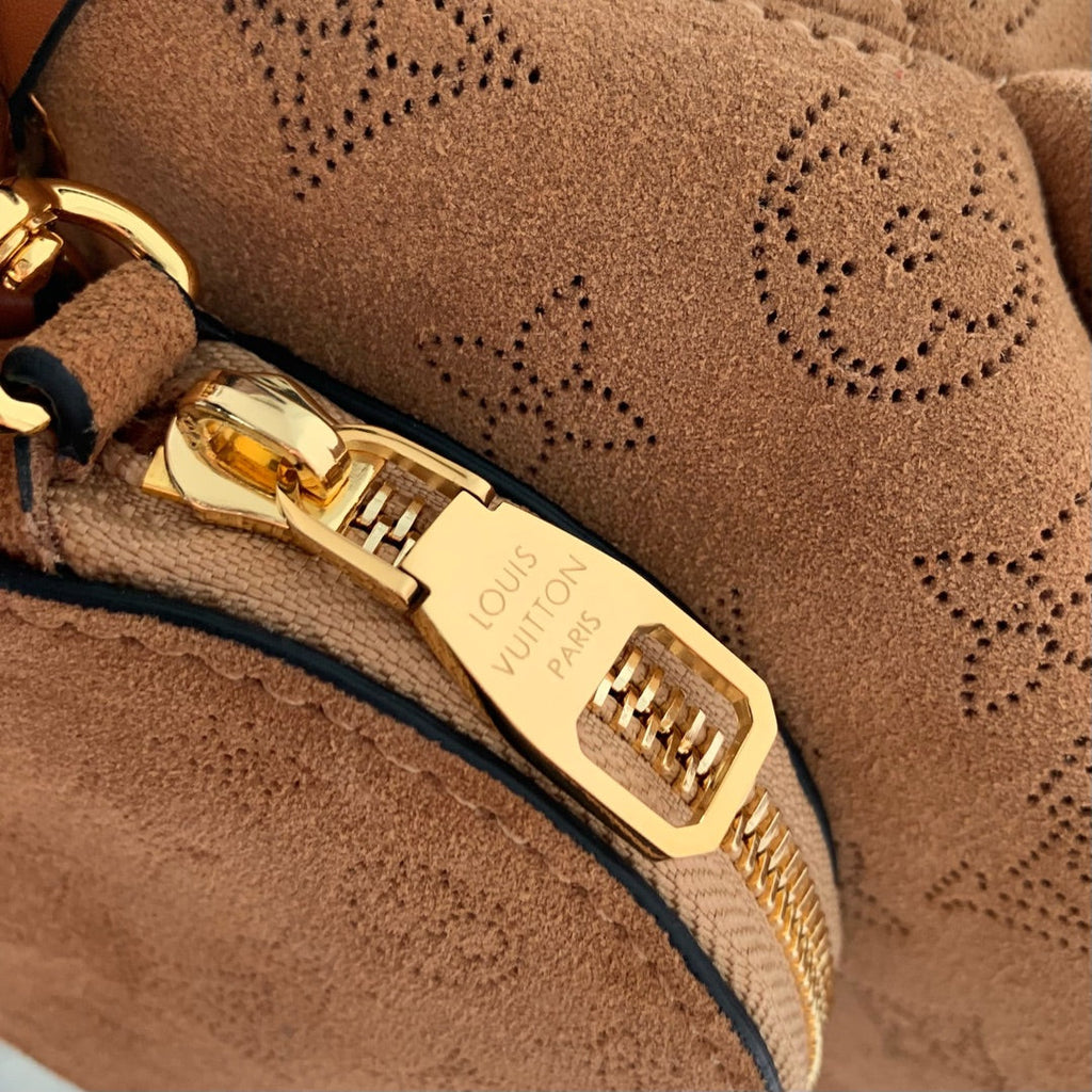 Louis Vuitton Bella 22 in Cinnamon Brown Monogram Perforated Suede and White Shearling Trim Bag