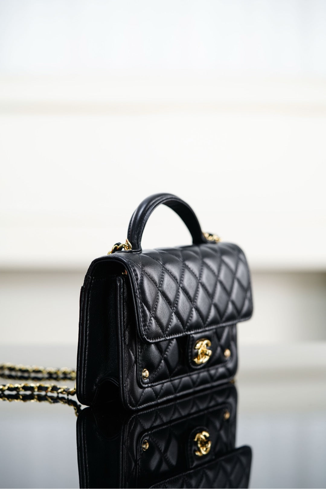 Chanel 25S Top Handle Flap 19 cm in Black Lambskin with Gold Hardware Bag