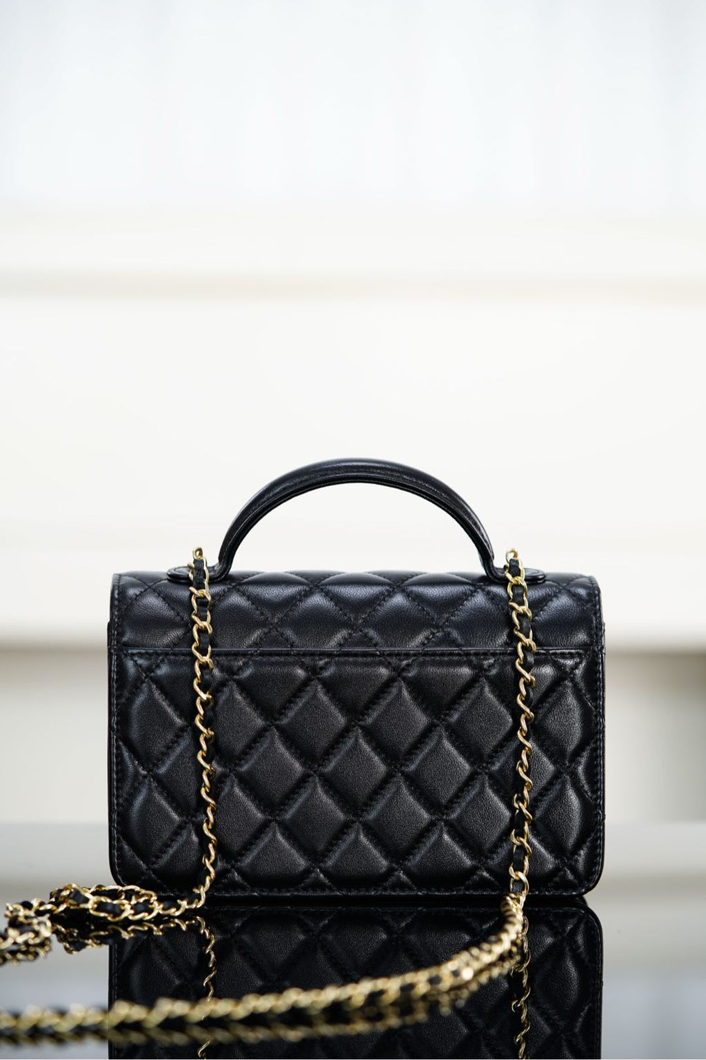 Chanel 25S Top Handle Flap 19 cm in Black Lambskin with Gold Hardware Bag