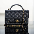 Chanel 25S Top Handle Flap 19 cm in Black Lambskin with Gold Hardware Bag