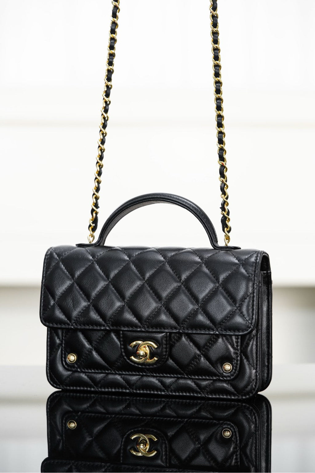 Chanel 25S Top Handle Flap 19 cm in Black Lambskin with Gold Hardware Bag
