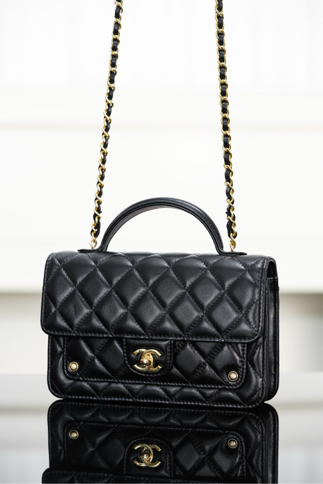 Chanel 25S Top Handle Flap 19 cm in Black Lambskin with Gold Hardware Bag