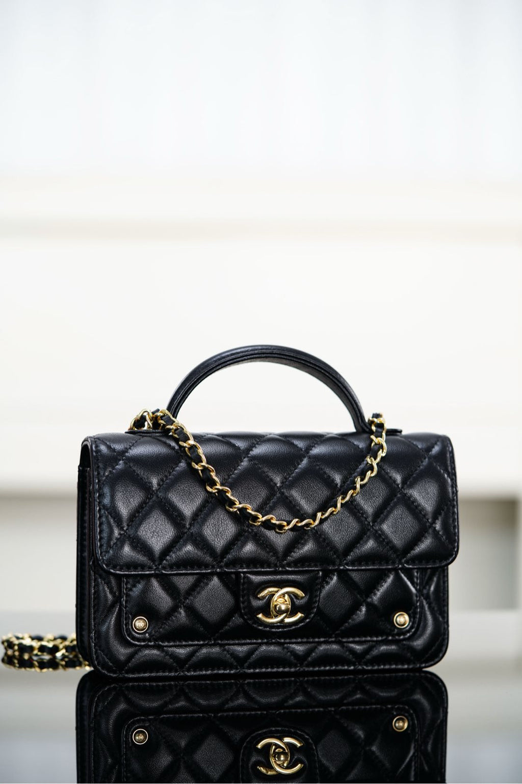 Chanel 25S Top Handle Flap 19 cm in Black Lambskin with Gold Hardware Bag