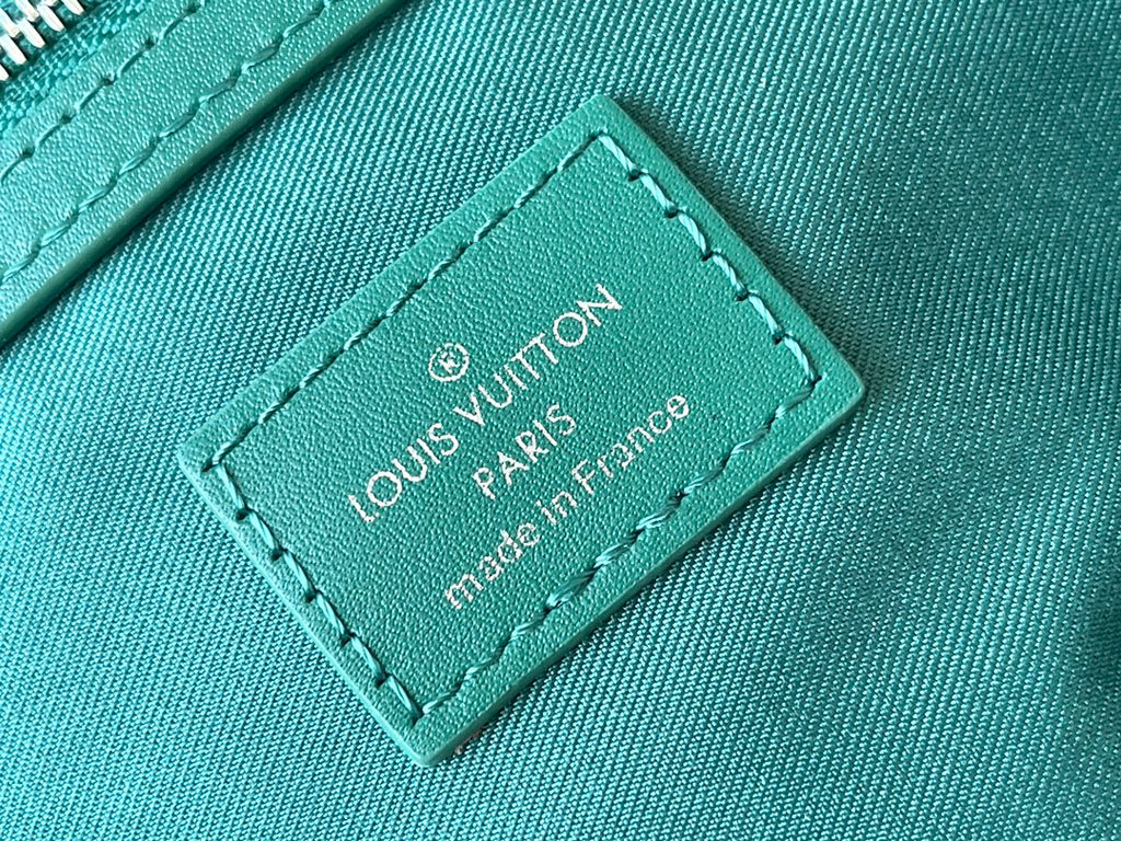 Louis Vuitton Keepall Bandoulière 50 in Green Monogram Heritage Canvas Bag