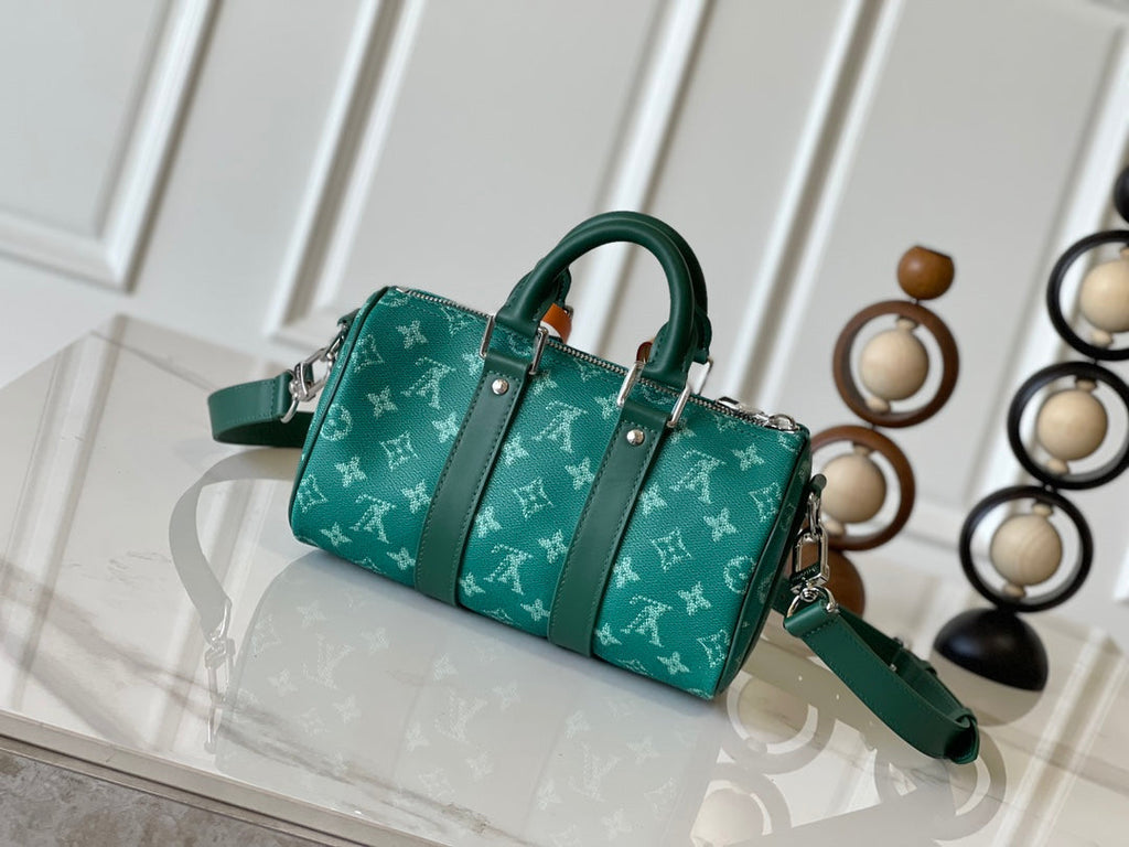 Louis Vuitton Keepall Bandoulière 25 in Green Monogram Heritage Canvas Bag