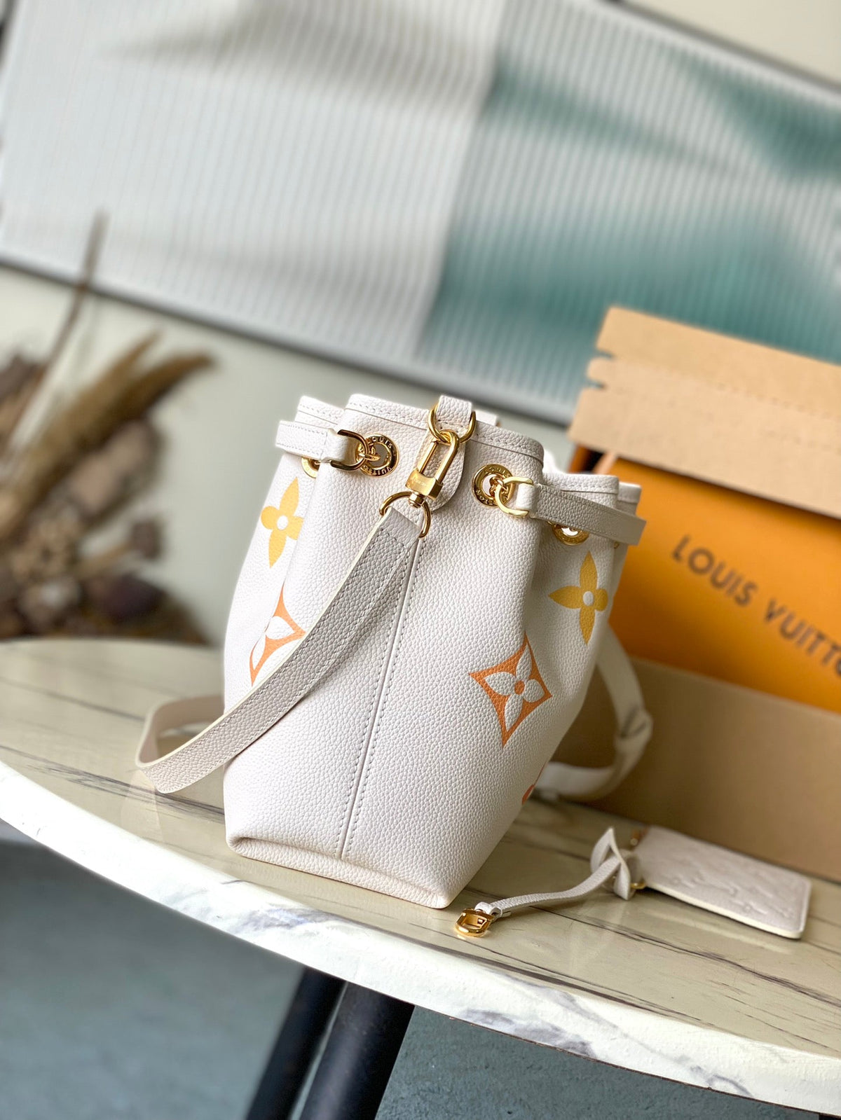 Louis Vuitton Bundle 28 in White Orange Monogram Empreinte Leather Gold Hardware Bag