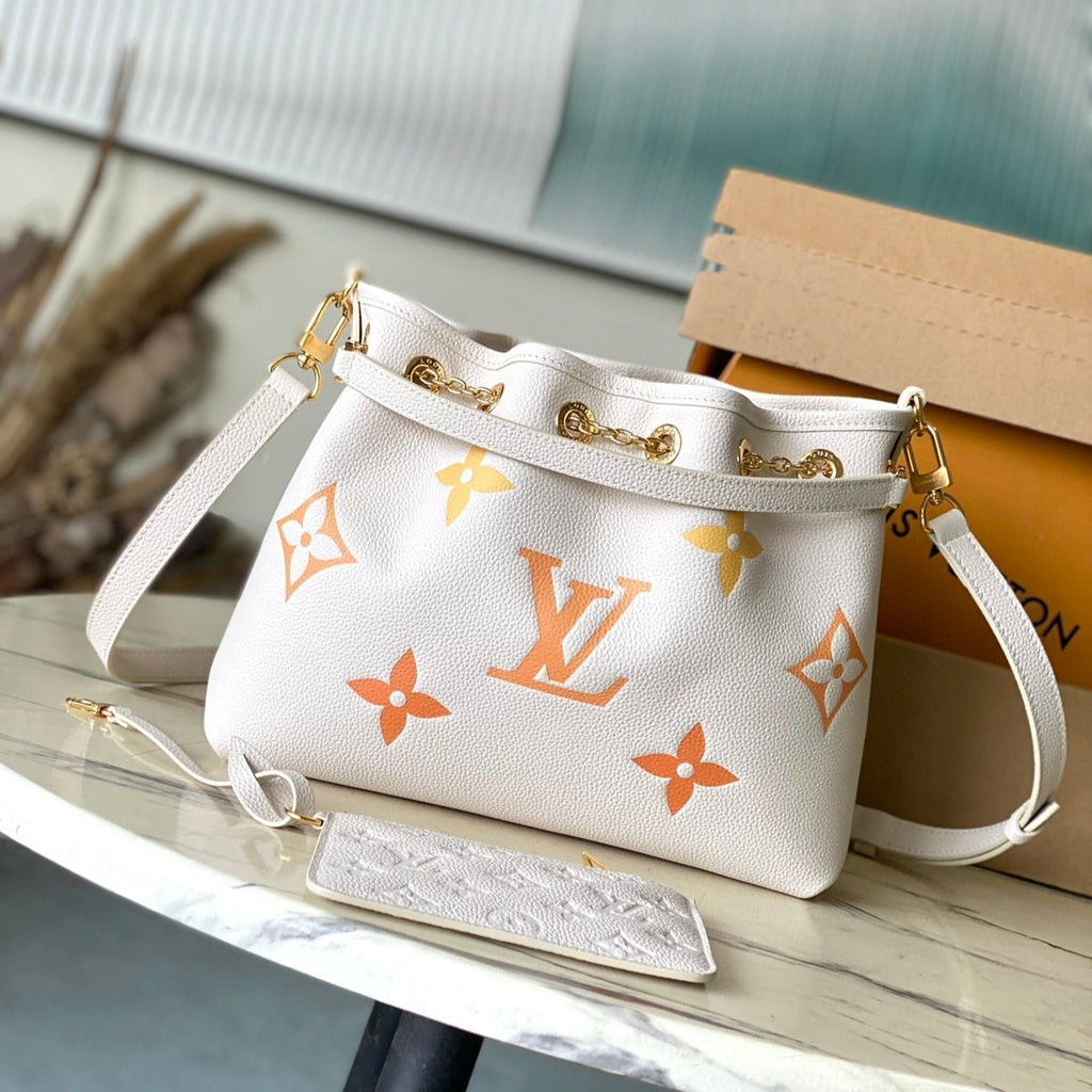 Louis Vuitton Bundle 28 in White Orange Monogram Empreinte Leather Gold Hardware Bag