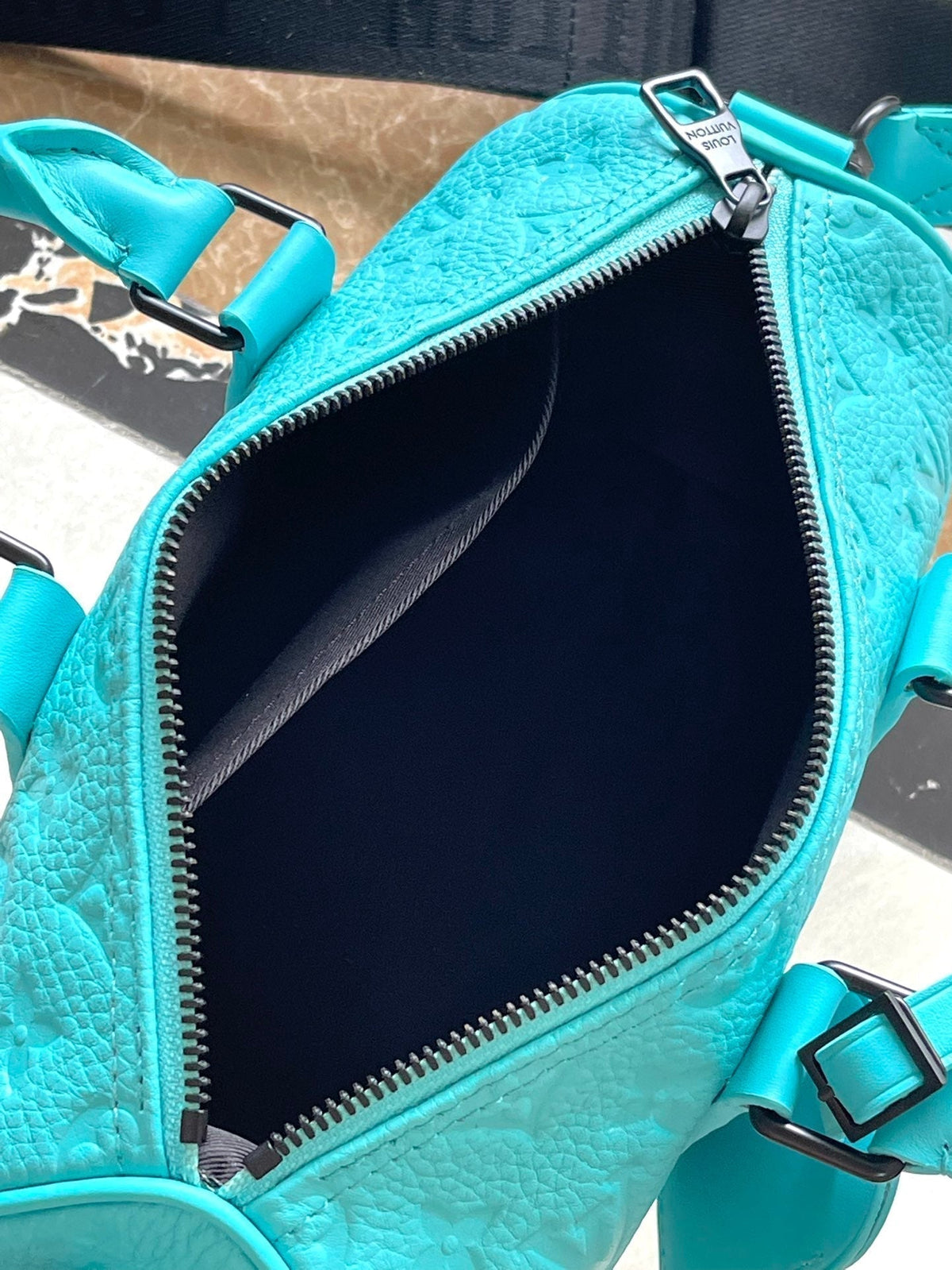 Louis Vuitton Keepall Bandoulière 25 in Turquoise Blue Monogram Embossed Calfskin Bag