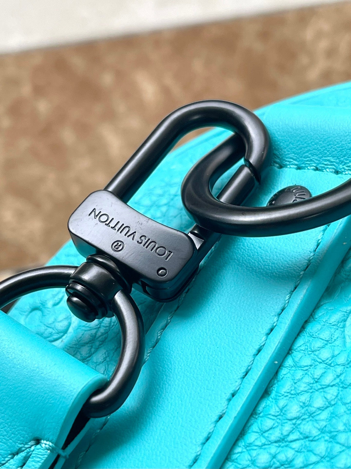 Louis Vuitton Keepall Bandoulière 25 in Turquoise Blue Monogram Embossed Calfskin Bag
