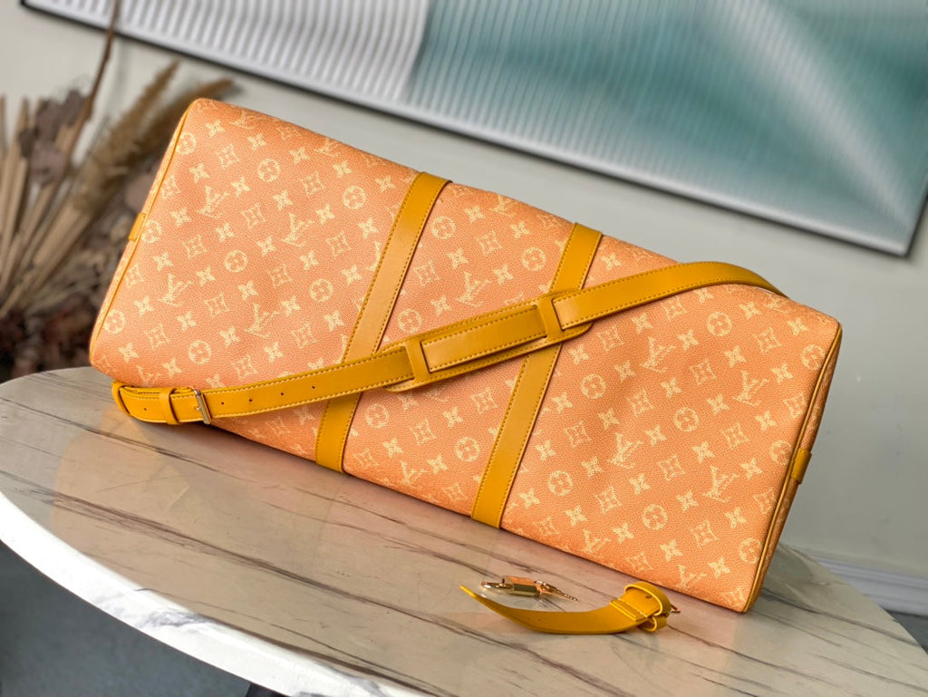 Louis Vuitton Keepall Bandoulière 55 in Orange Monogram Heritage Canvas Bag