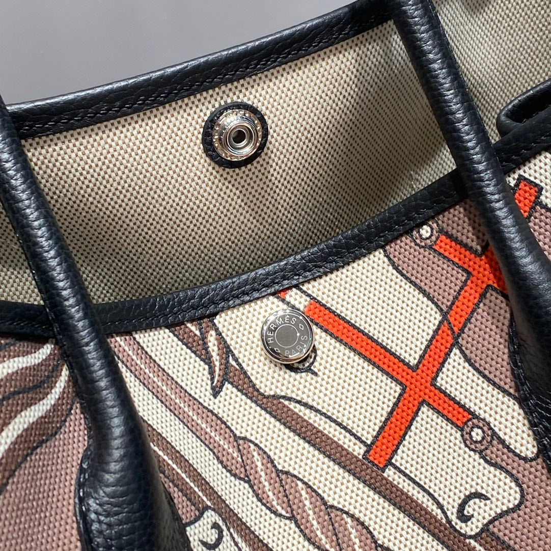 Hermes Garden Party 36 in Beige Orange and Brown Toile H Canvas Black Calfskin Horse Totem Print Bag