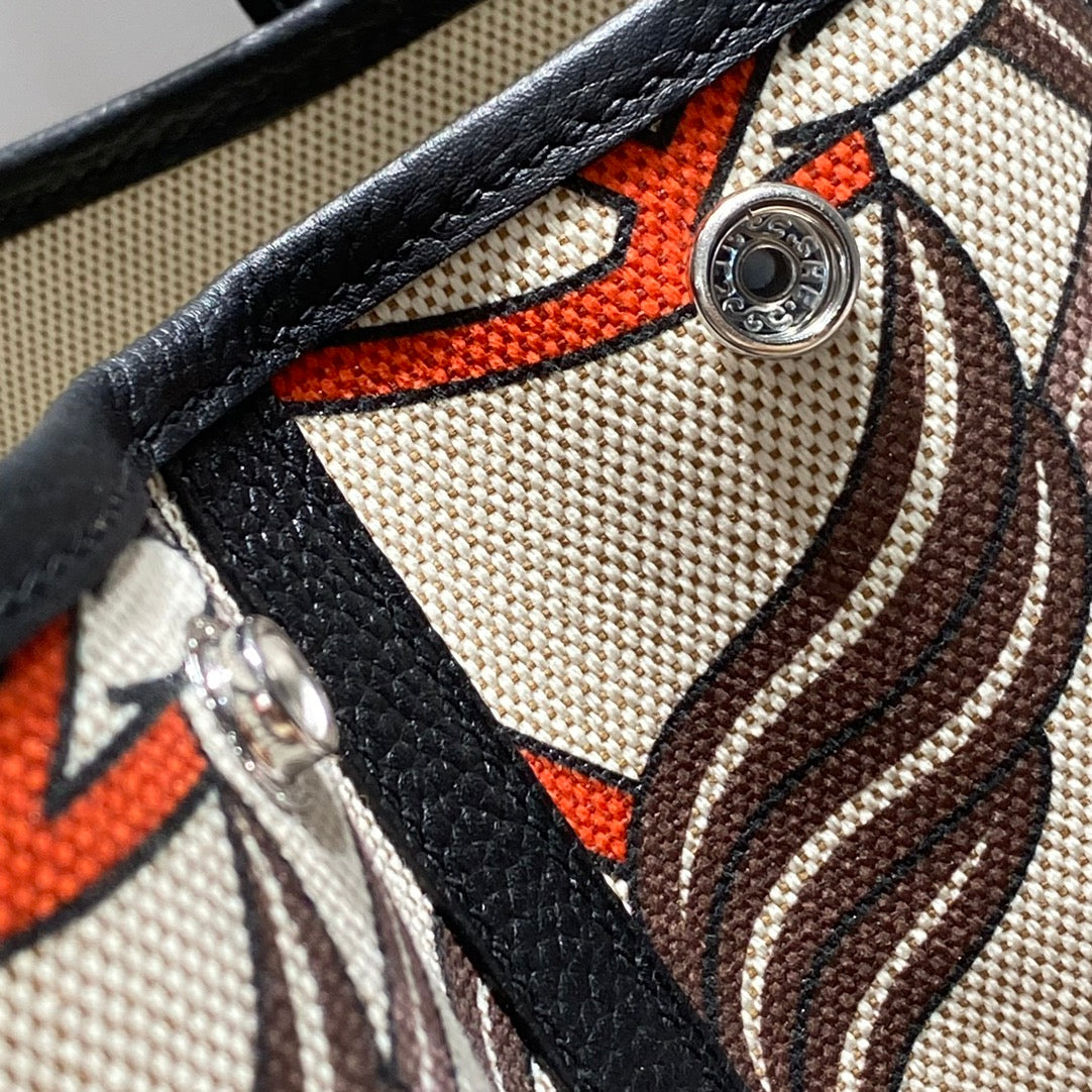 Hermes Garden Party 36 in Beige Orange and Brown Toile H Canvas Black Calfskin Horse Totem Print Bag