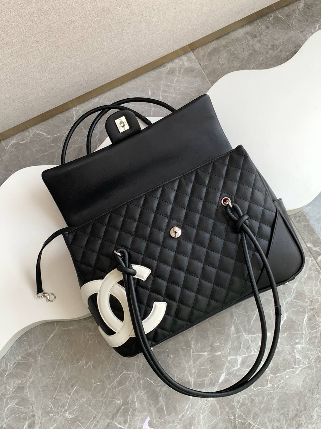 Chanel Cambon Large Flap 25S 33 cm in Black Calfskin with White Logo Bag