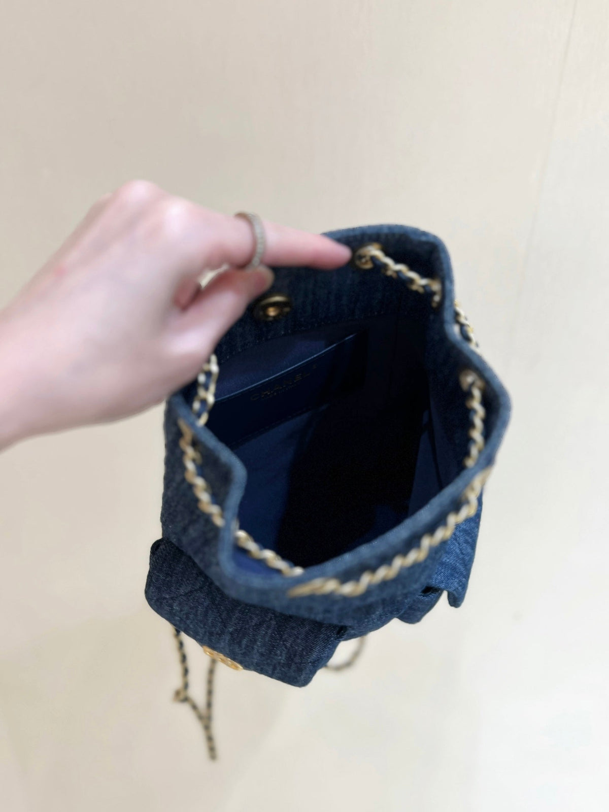 Chanel Drawstring Bucket Backpack 24 in Dark Blue Denim Gold Hardware