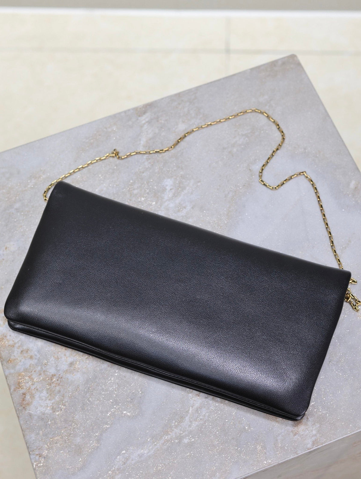 Saint Laurent Calypso Pouch 24 in Black Lambskin Gold Logo