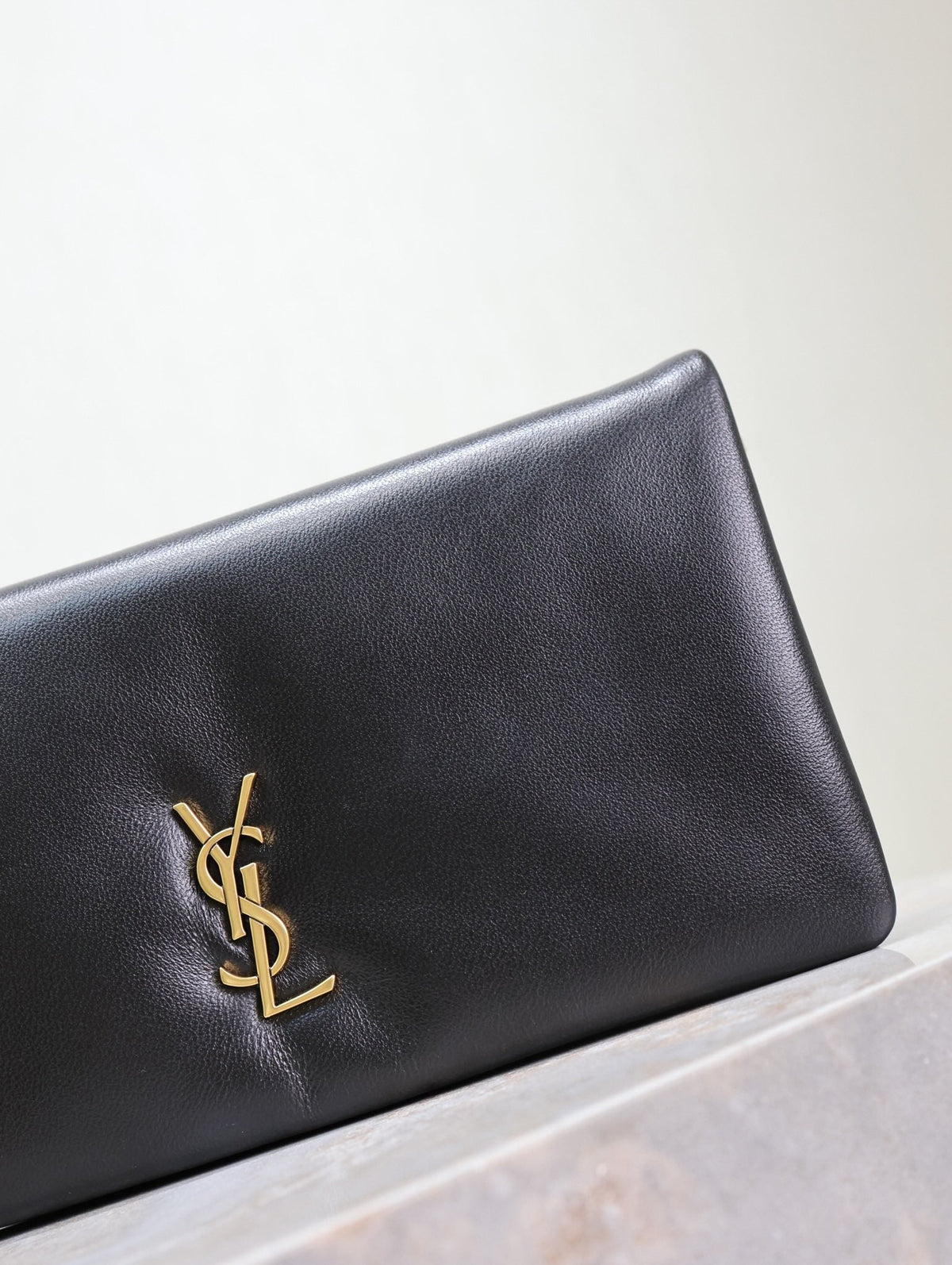 Saint Laurent Calypso Pouch 24 in Black Lambskin Gold Logo